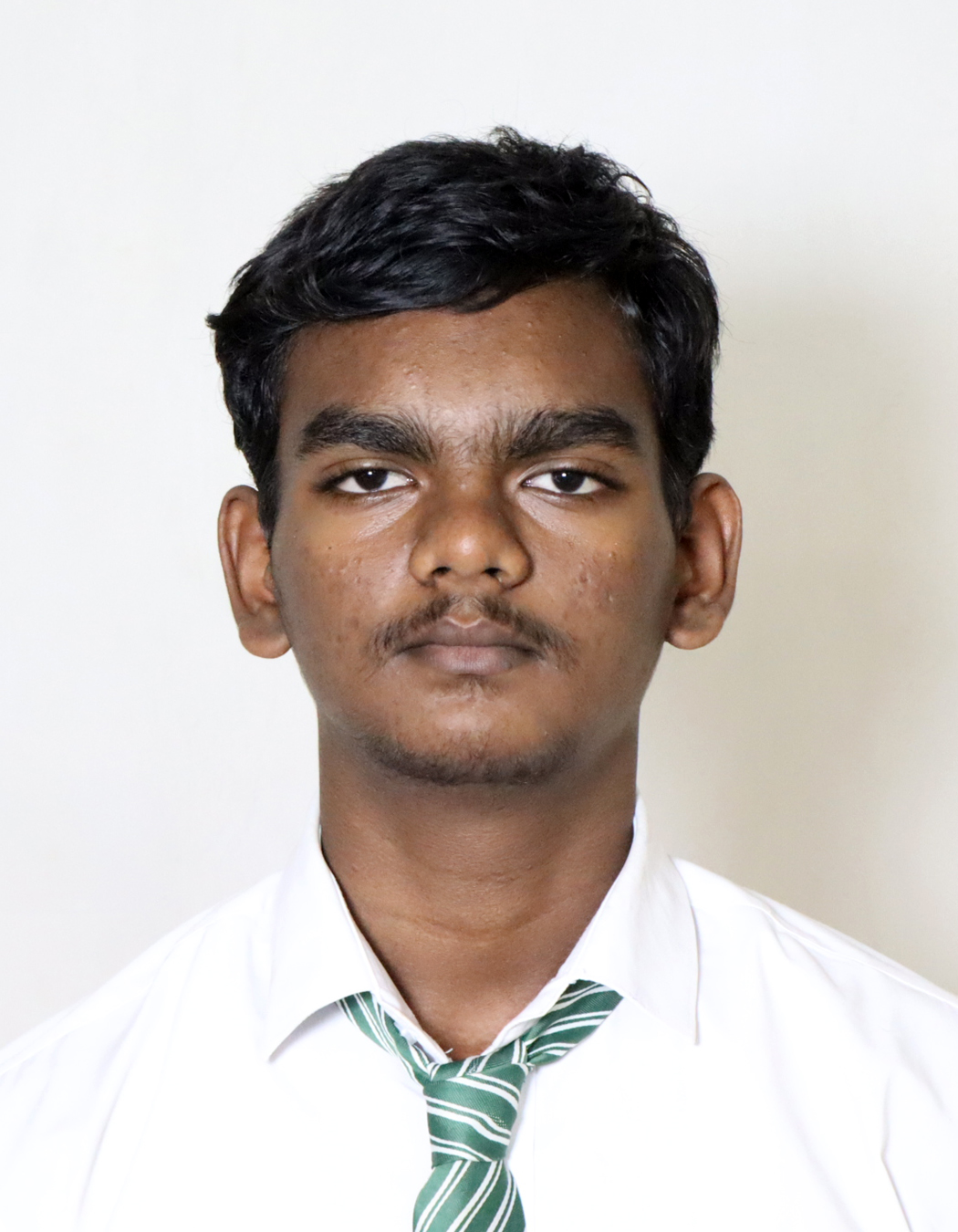 DEVANESH J