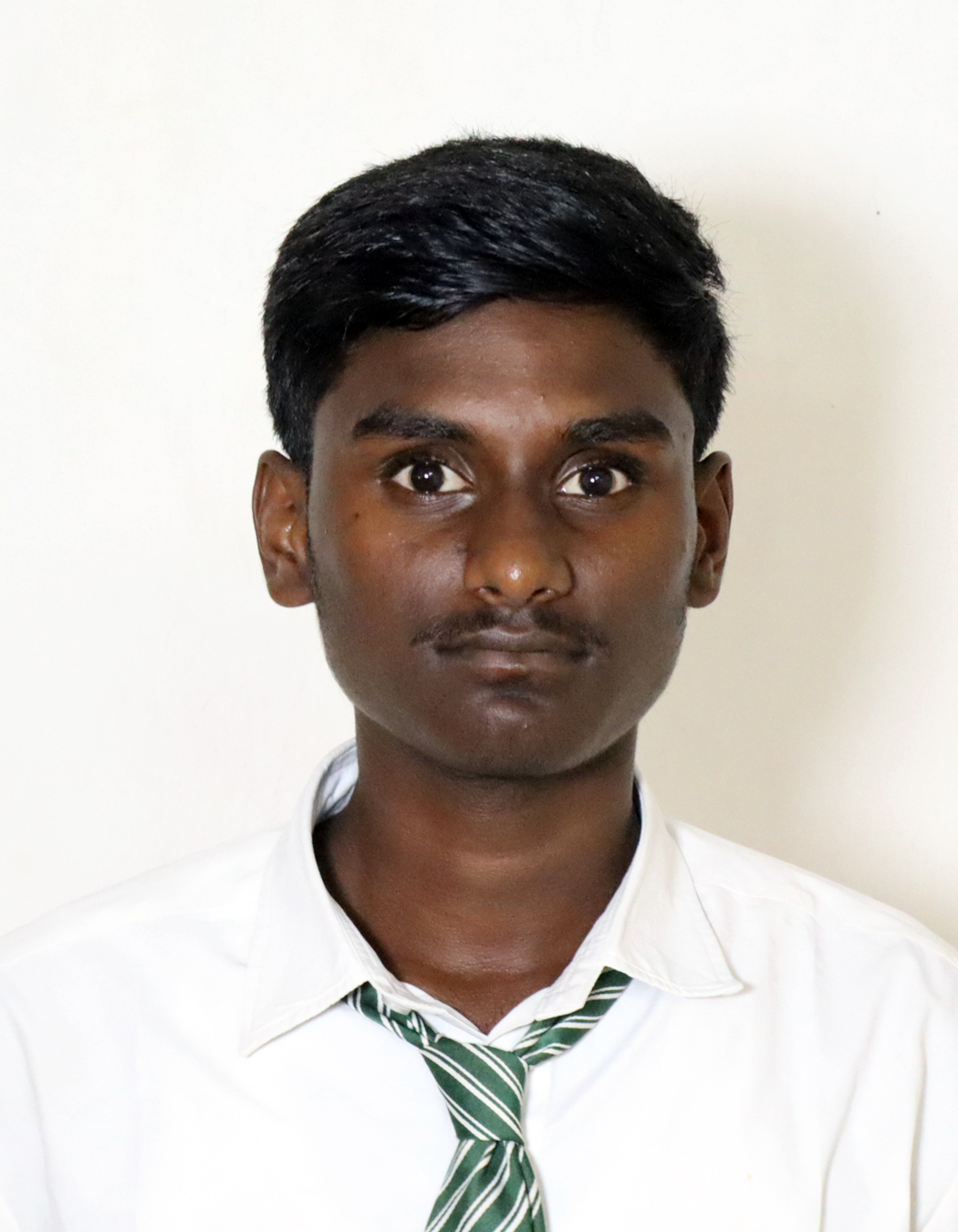 SUMAN M M